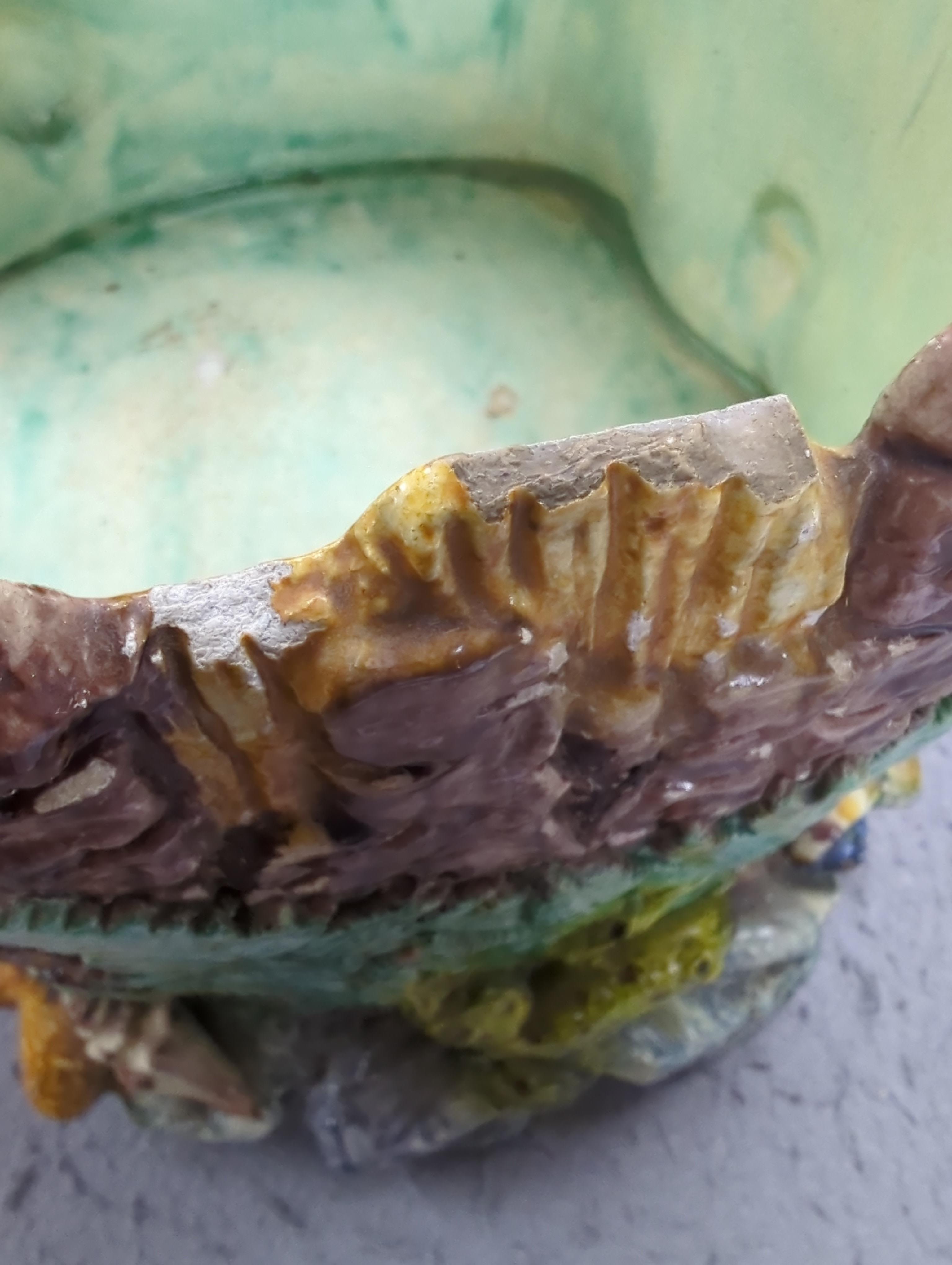A Thomas Sergent majolica jardiniere decorated with aquatic life, initialled to the base, 18cm high